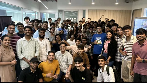 Large group of participants gathered in a shared workspace