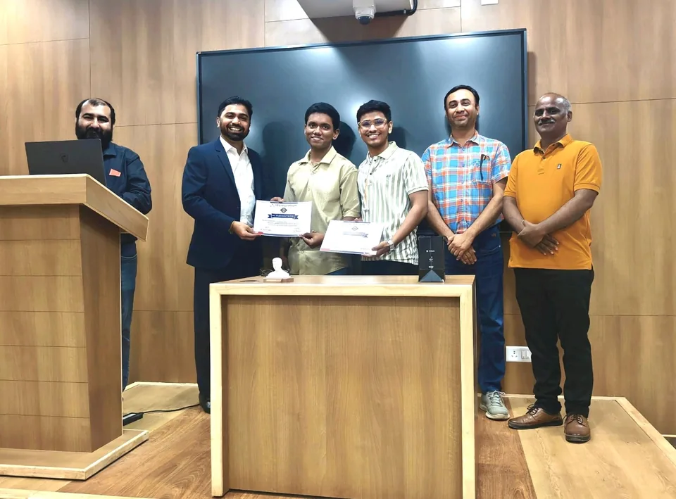 Shubham Sahu receiving top-ten recognition and a certificate at the M-Indicator AI Hackathon