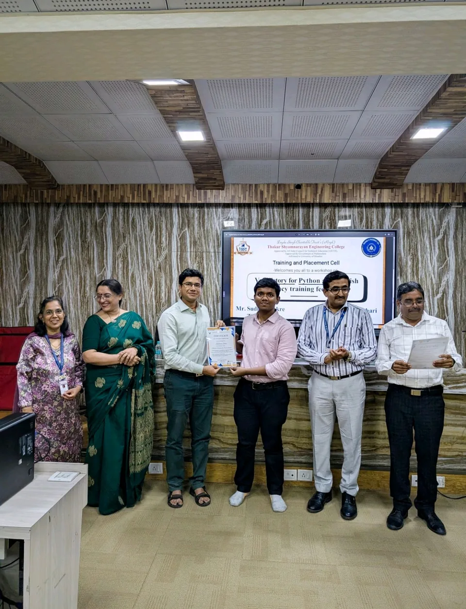 Shubham Sahu receiving a best-student certificate at a TSEC Python workshop